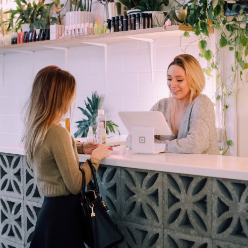 Woman at a receptionist desk